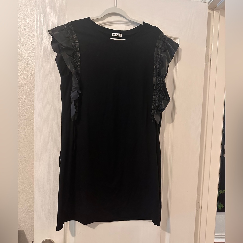 Knee length black dress with leather flutter shoulders